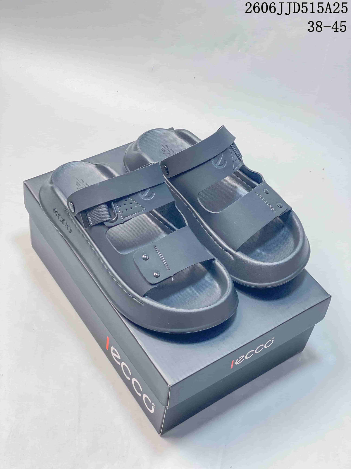 Gray and olive-toned adjustable strap sandals shown in side profile alongside a box.