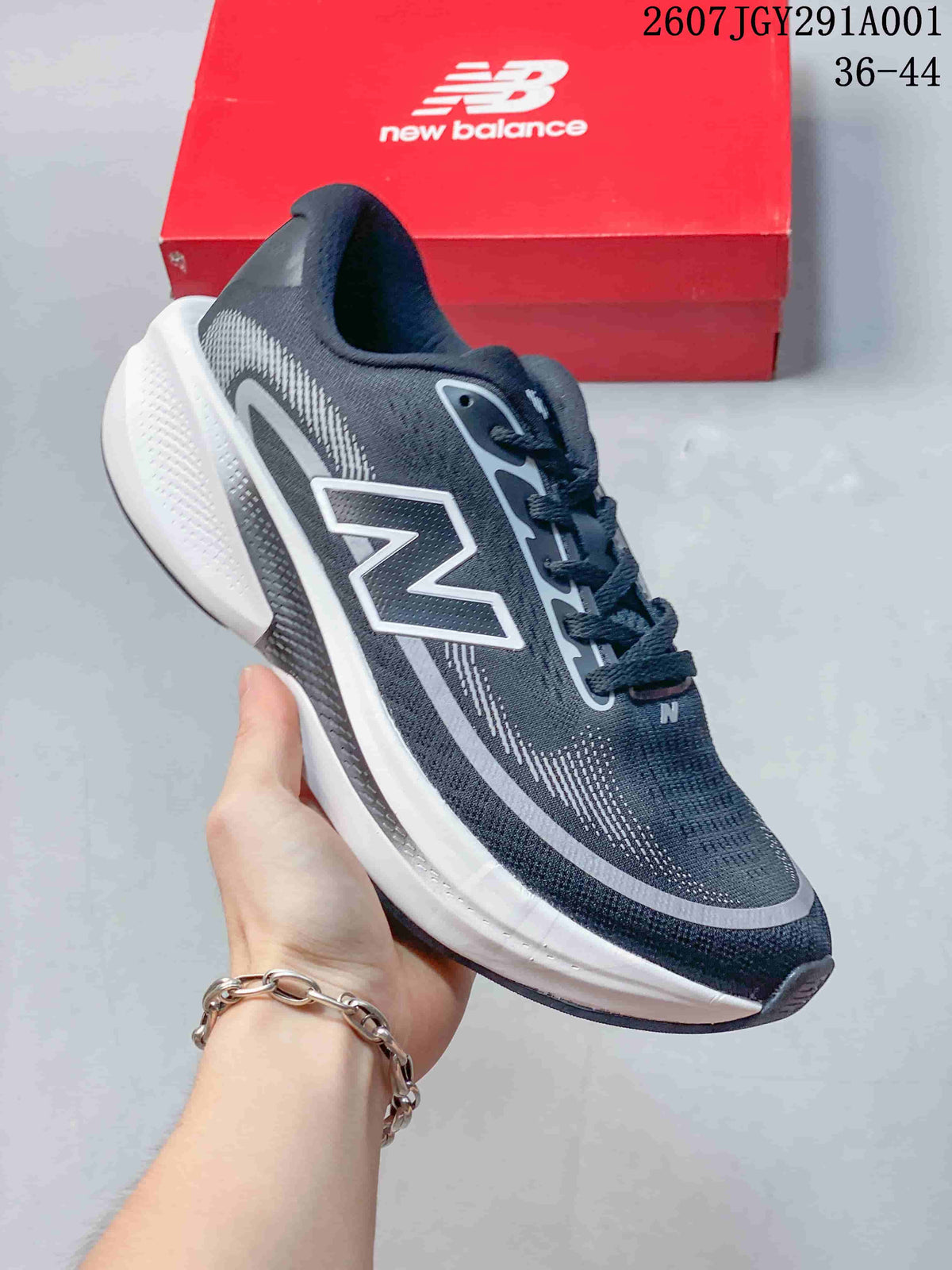 Dark navy New Balance running shoe with gray accents and a white sole.