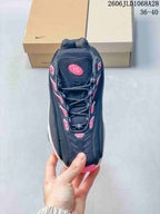 Top view of the sneaker showing its lace-up front and pink detailing