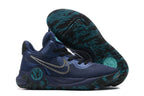 Navy blue basketball shoe with teal accents and dark patterned outsole.