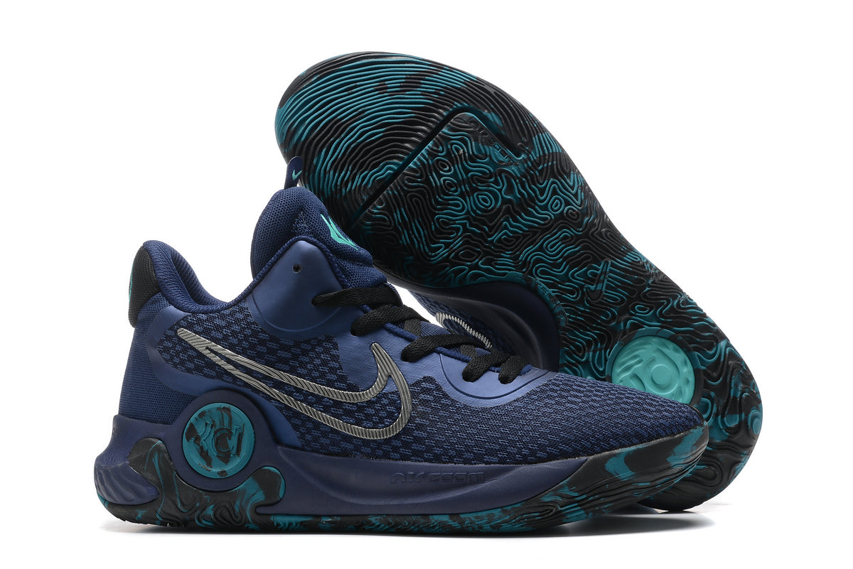 Navy blue basketball shoe with teal accents and dark patterned outsole.