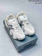Pair of white and light grey New Balance 9060 sneakers displayed on a New Balance shoebox; overlay text shows style code 2607JGD1098A18 and size range 36–45 with half sizes.