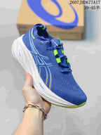 Angled side view showing the blue upper, ASICS logo, white midsole and green outsole edge.