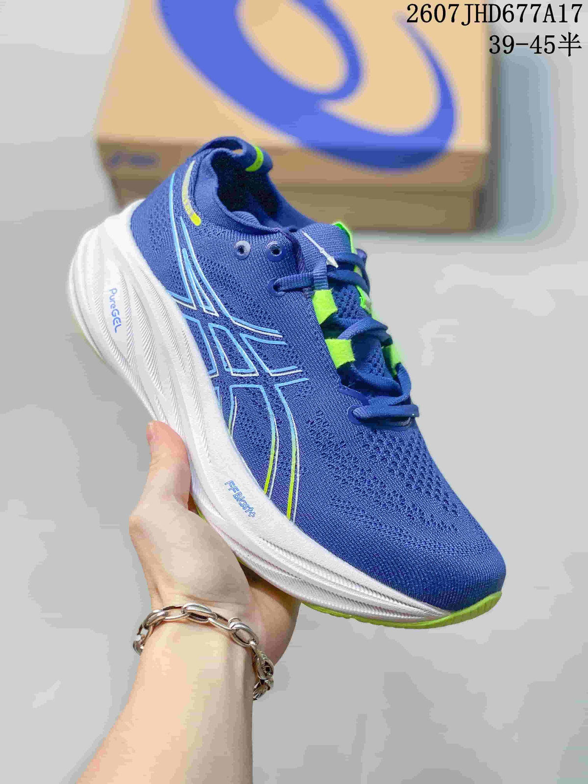 Angled side view showing the blue upper, ASICS logo, white midsole and green outsole edge.