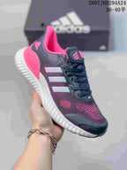 Angled side view of the black, pink and white adidas Switch FWD sneaker.
