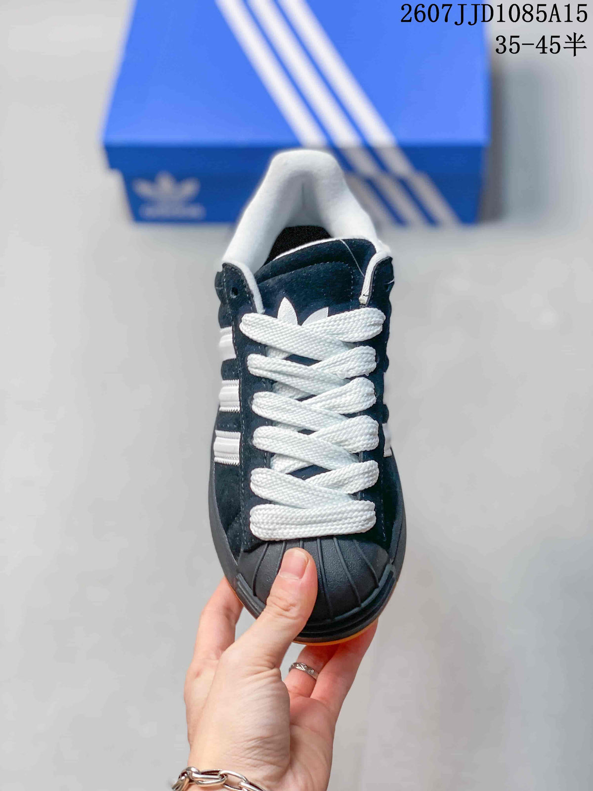 Top view showing the white laces, black shell toe, and padded white collar.
