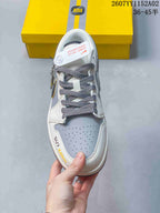 Top view showing perforated toe panel and patterned laces