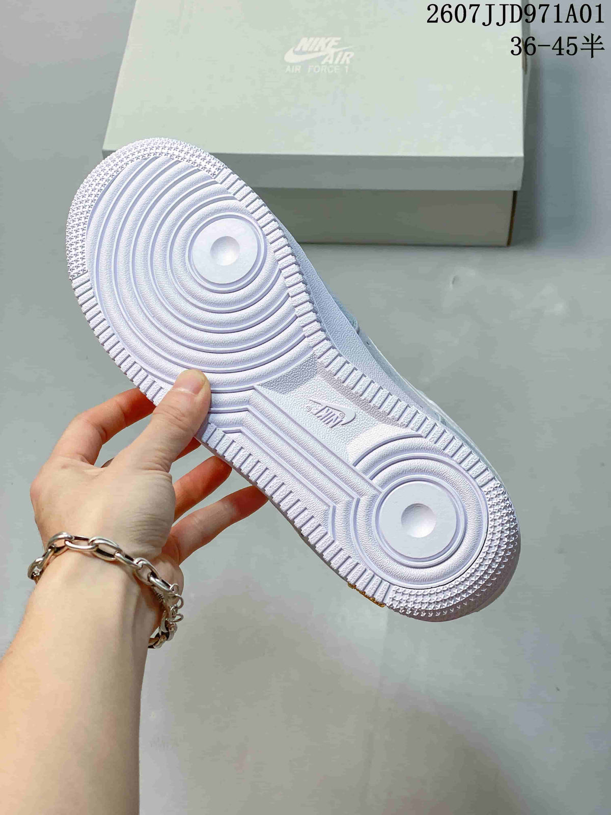 Close-up of the white rubber outsole with circular tread details