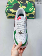 Top view showing the perforated toe, white laces, and green trim