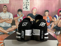 Rear view of black and white Nike GT-style basketball shoes