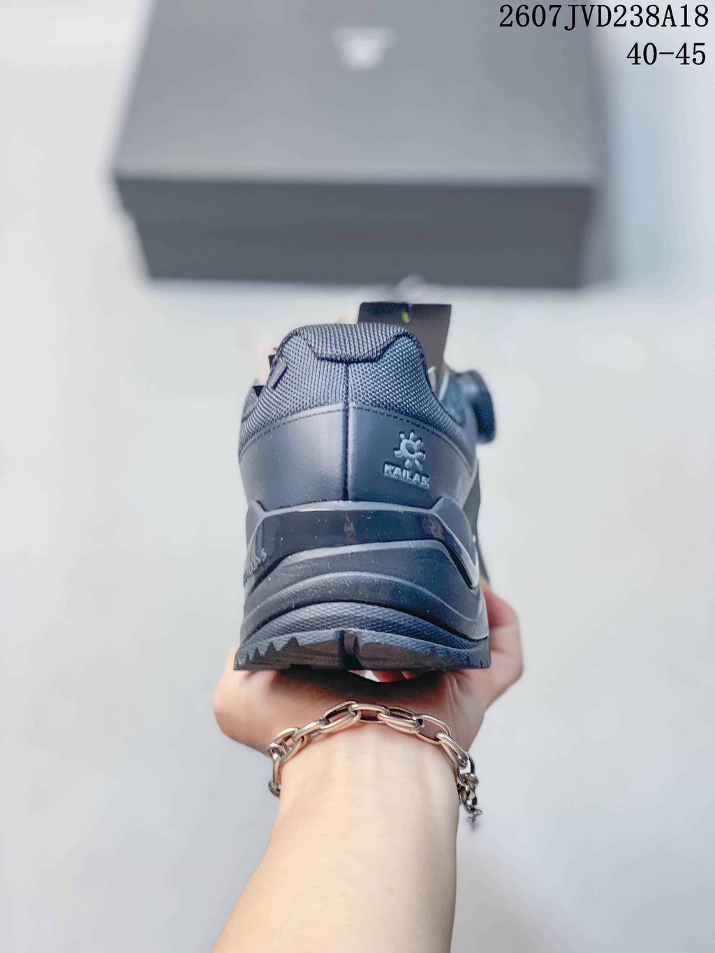 Rear view of the dark gray hiking shoe showing the KAILAS heel logo, padded collar and rugged outsole.