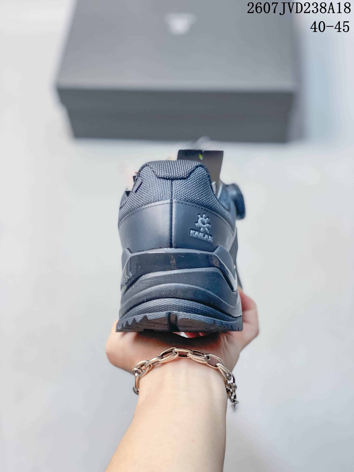 Rear view of the dark gray hiking shoe showing the KAILAS heel logo, padded collar and rugged outsole.