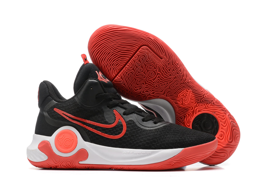 Black basketball shoe with red Swoosh, red outsole accents, and white midsole.