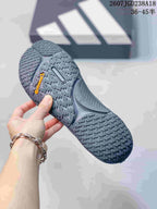 Bottom view of a sneaker showing the patterned rubber outsole and Continental branding.
