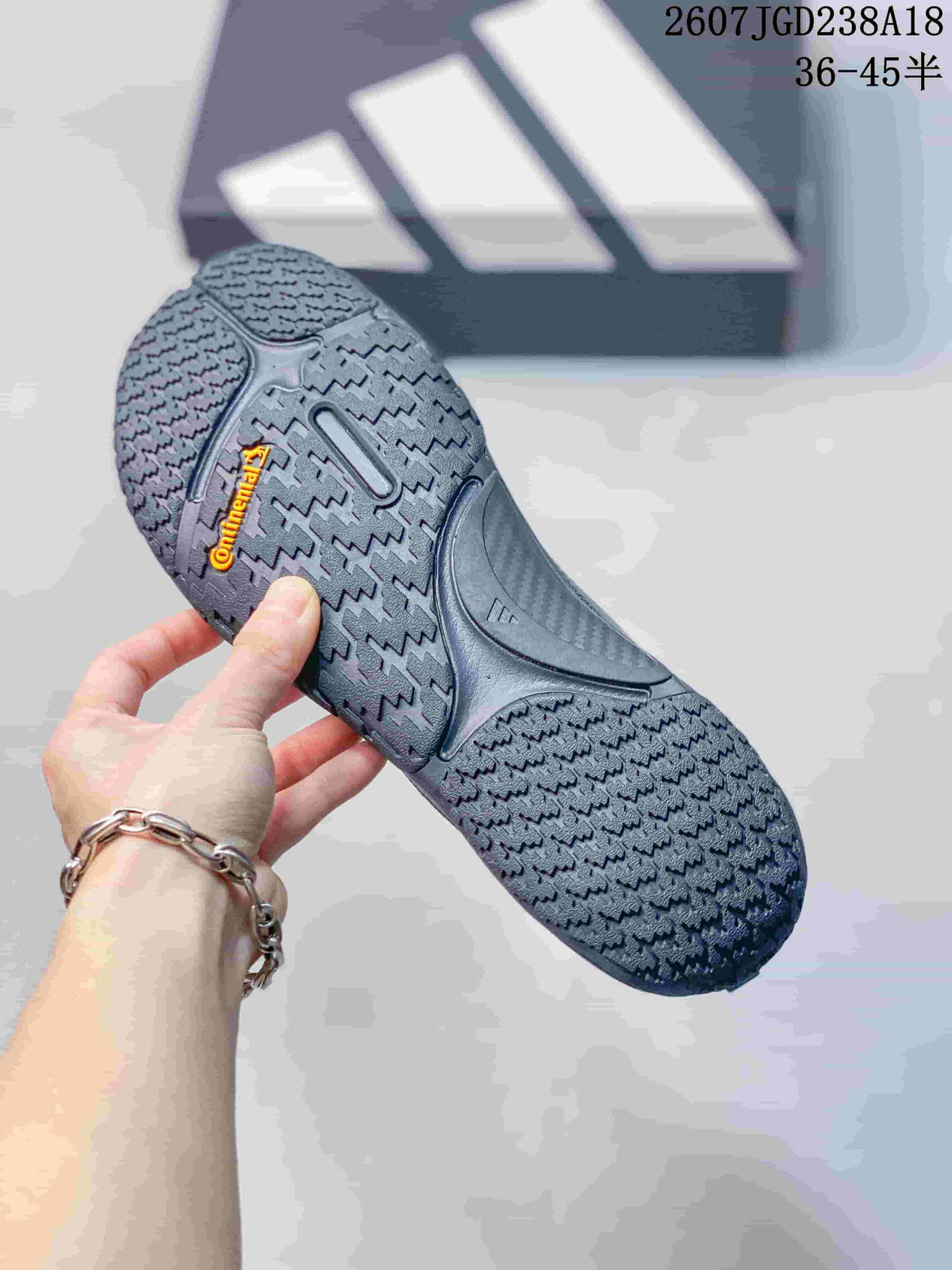 Bottom view of a sneaker showing the patterned rubber outsole and Continental branding.