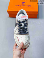 Top view showing the perforated toe and dark woven laces