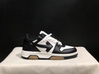Single side profile highlighting the black and white upper, padded collar, and chunky sole.