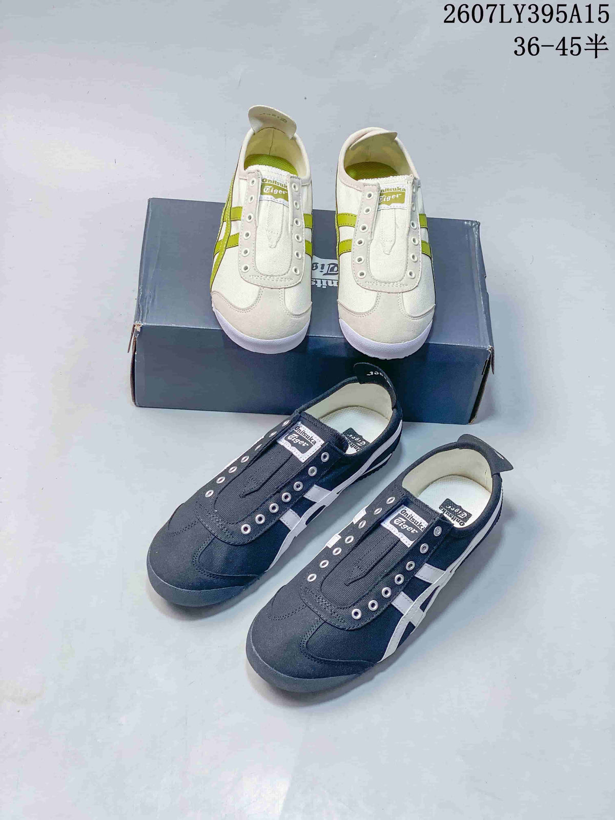Top view showing white and lime and black and white colorways of the Onitsuka Tiger sneakers together with the shoe box.