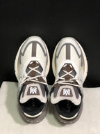 Top view showing the lace-up construction, padded tongues and contrasting grey details.