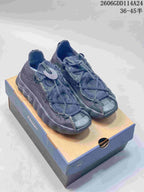 Pair of dark gray Nike Mind 002 SP FK low-top shoes on a shoe box
