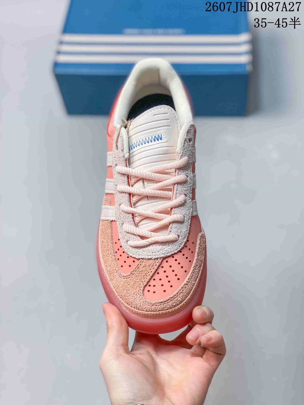 Top view showing the lace-up closure, perforated toe panels and textured overlays.