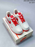 Pair of white and red low-top sneakers displayed on a Nike shoebox, with the style code and size range visible above.