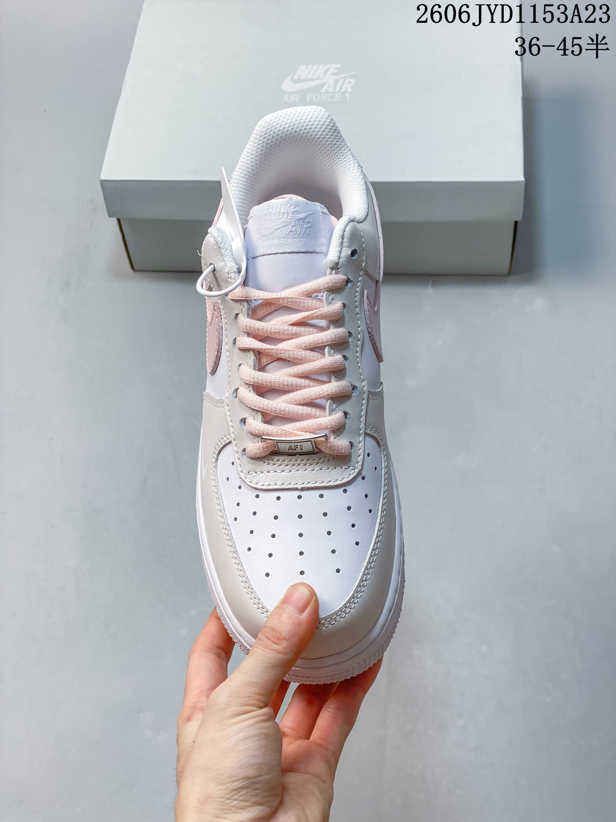 Top view showing perforated toe, pale-pink laces and pink accents; image overlay shows 36–45.5.