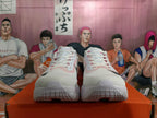 Front view of white Nike running shoes with pink accents and dark Swoosh logos