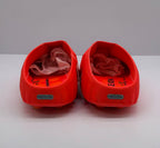Rear view of the pair showing heel badges and printed footbeds.