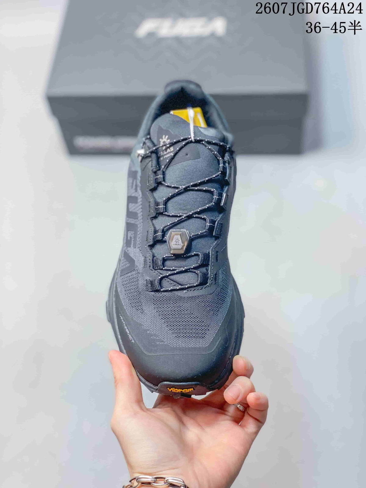 Top view showing the mesh-style upper, quick-lacing system, toe bumper, and Vibram marking.