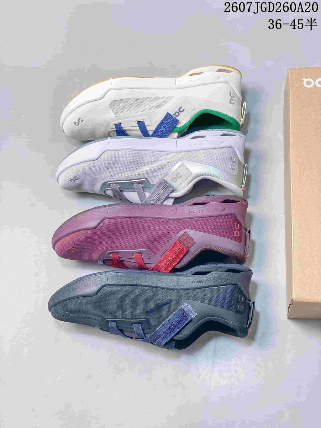 Top-down view of four shown Cloudnova Moon colorways in white, pale lavender, pink, and navy.