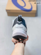 Rear view of the ASICS Swiftace sneaker showing the Swiftace heel panel, padded collar, and FlyteFoam marking.