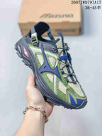 Angled side view highlighting the layered upper, padded collar, and rugged sole.