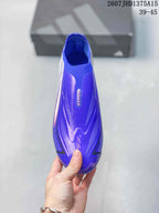 Top view of a purple laceless soccer cleat showing the sock-like collar and F50 forefoot branding.