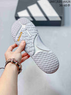 Close-up of the textured outsole showing patterned tread and visible Continental branding