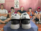 Rear view of white and black Nike basketball shoes