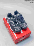 Pair of black and white Nike Air Max Plus TN sneakers displayed on a red Nike shoebox; image text shows 2607ND775A25 and size range 36–47.