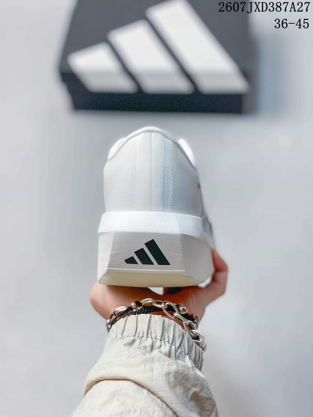 Rear view showing the white heel and adidas logo on the heel counter.
