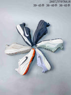 Multiple Nike ACG Pegasus Trail colorways arranged together, including navy, green, white, orange-accented and lavender styles.