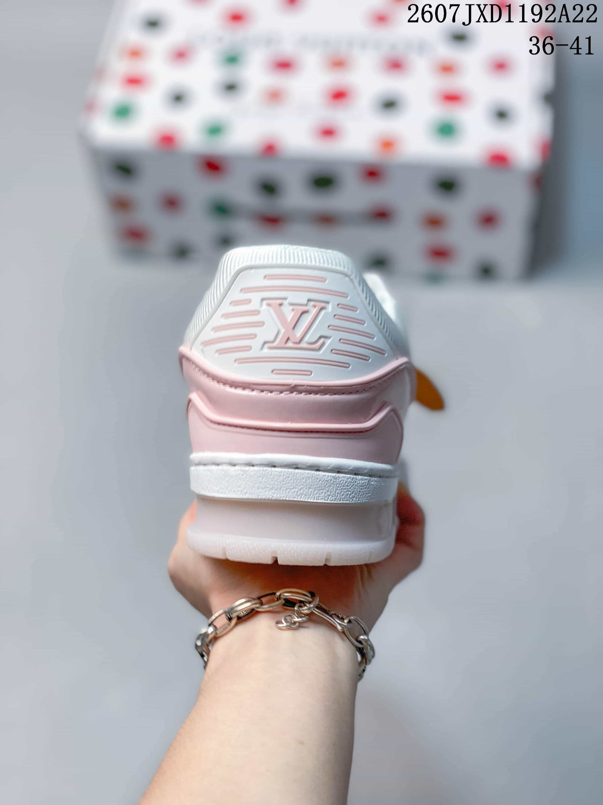Rear view showing the padded heel, layered construction and LV heel emblem.