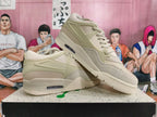 Angled view of beige Nike sneakers showing the side panels, laces, and heel Air unit.