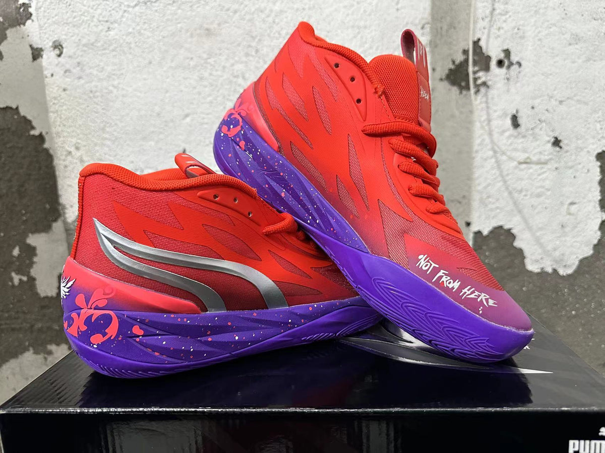 Pair of red Puma Melo basketball shoes with purple soles and graphic accents.