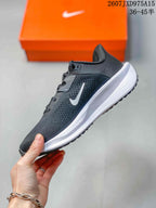 Side profile showing the mesh-textured upper, white Swoosh, and layered midsole.