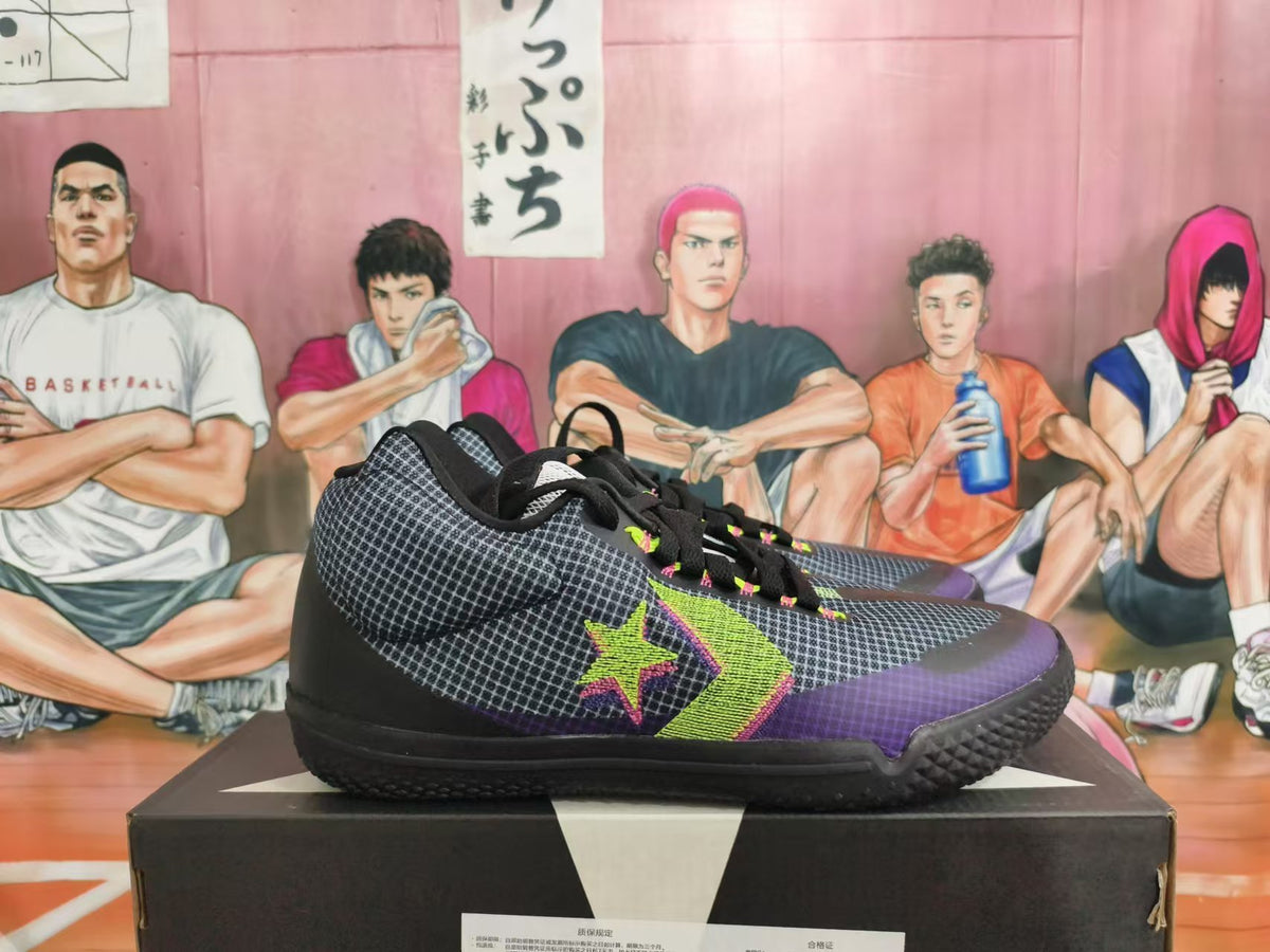 Side view of a Converse basketball shoe with a green star-and-chevron logo and purple accents