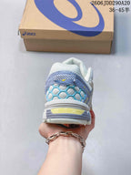 Rear view of the sneaker showing the padded heel, blue mesh detailing and layered sole.