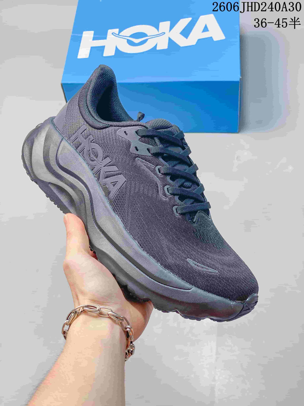 Dark gray HOKA Arahi 8 running shoe shown from the side.