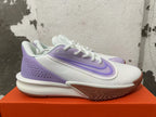 Side view highlighting the light purple panels and visible Precision 7 midsole text