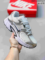 White and pale gray Nike V5 RNR sneaker with dark accent details.