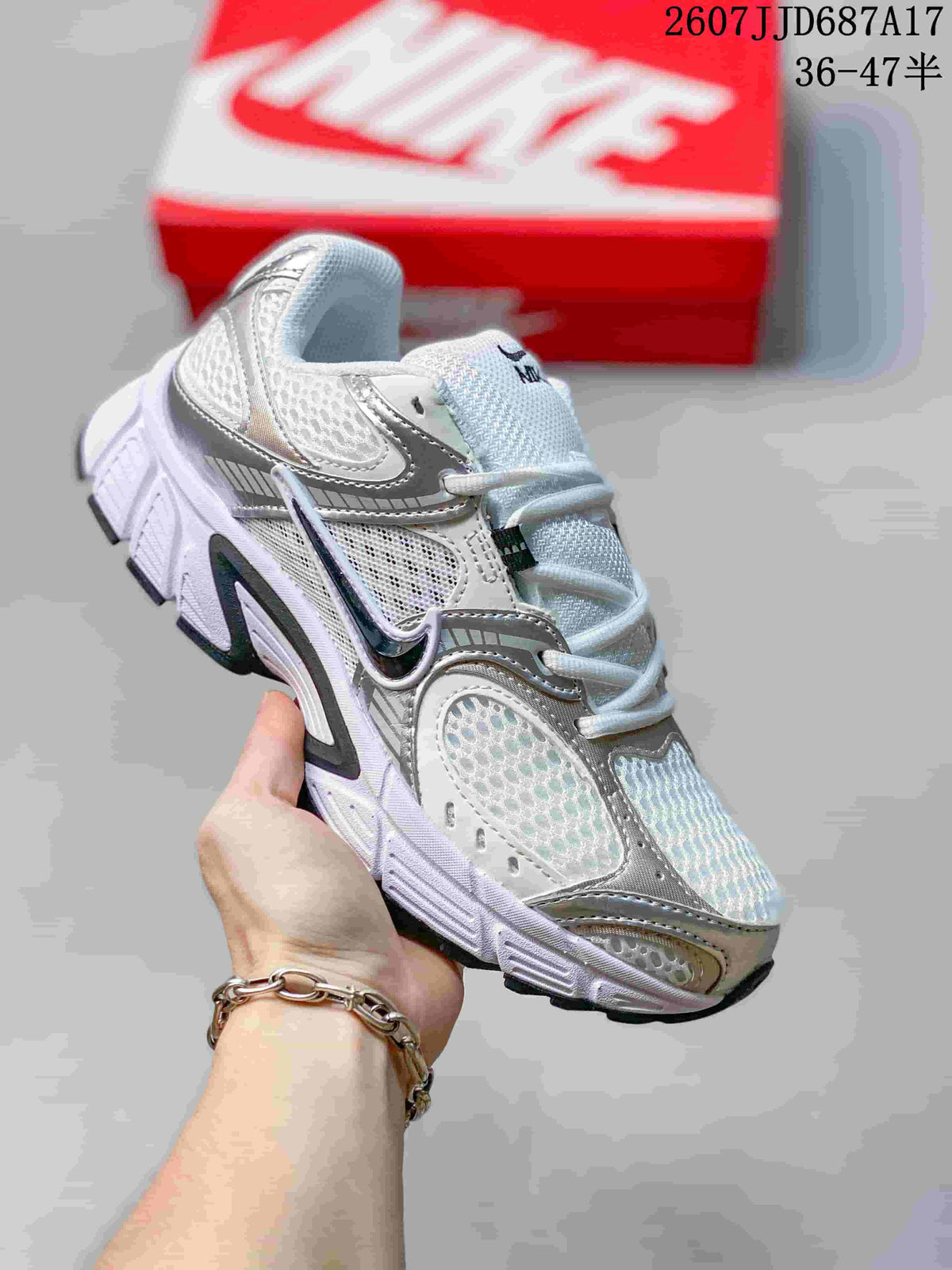 White and pale gray Nike V5 RNR sneaker with dark accent details.