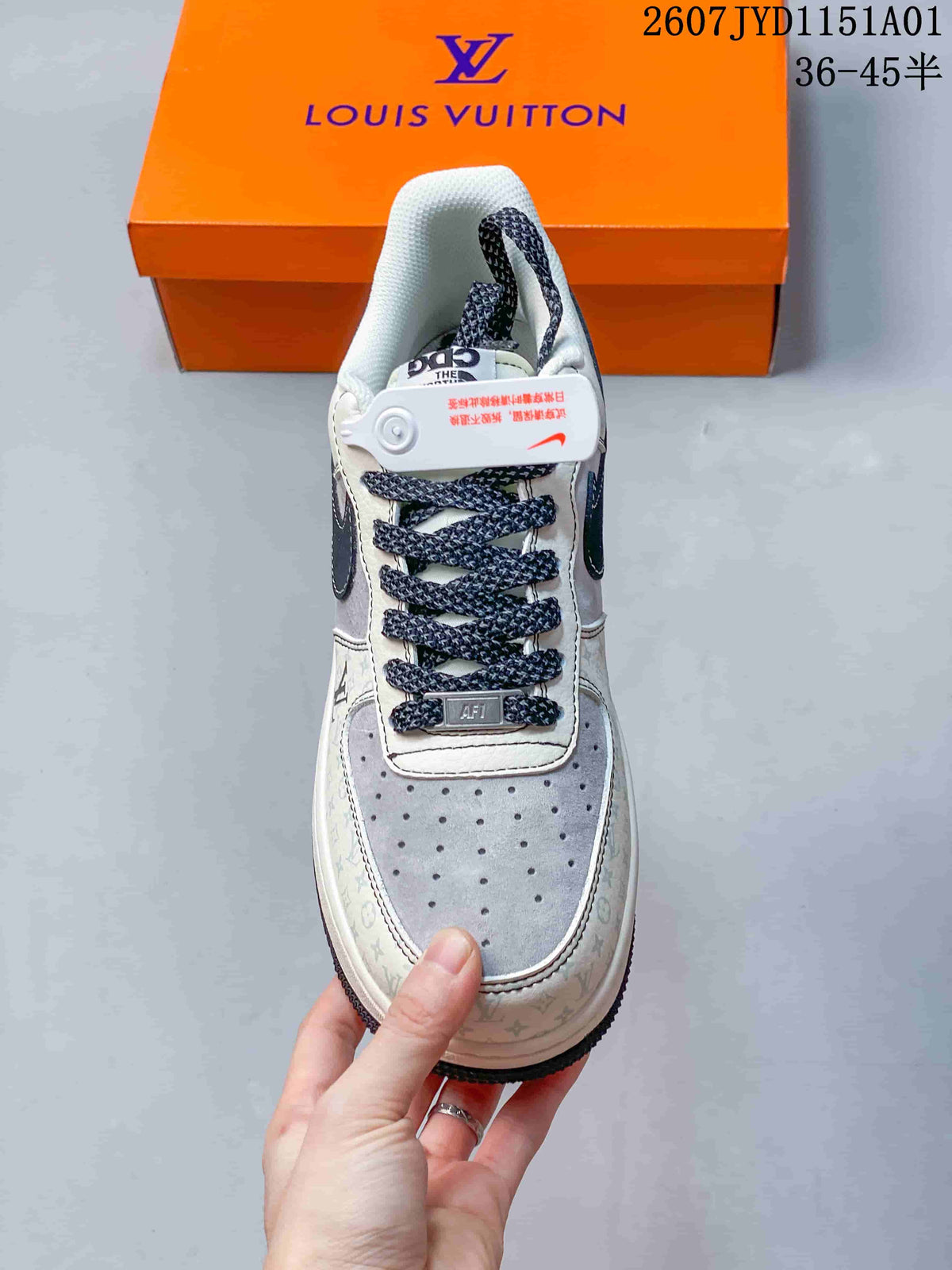 Top view showing the perforated gray toe, patterned cream panels, and dark patterned laces.